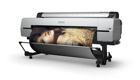 An Epson large-format printer feeding out a photographic print