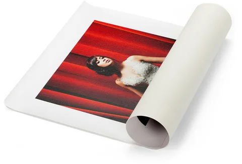 A loose canvas print, partly rolled